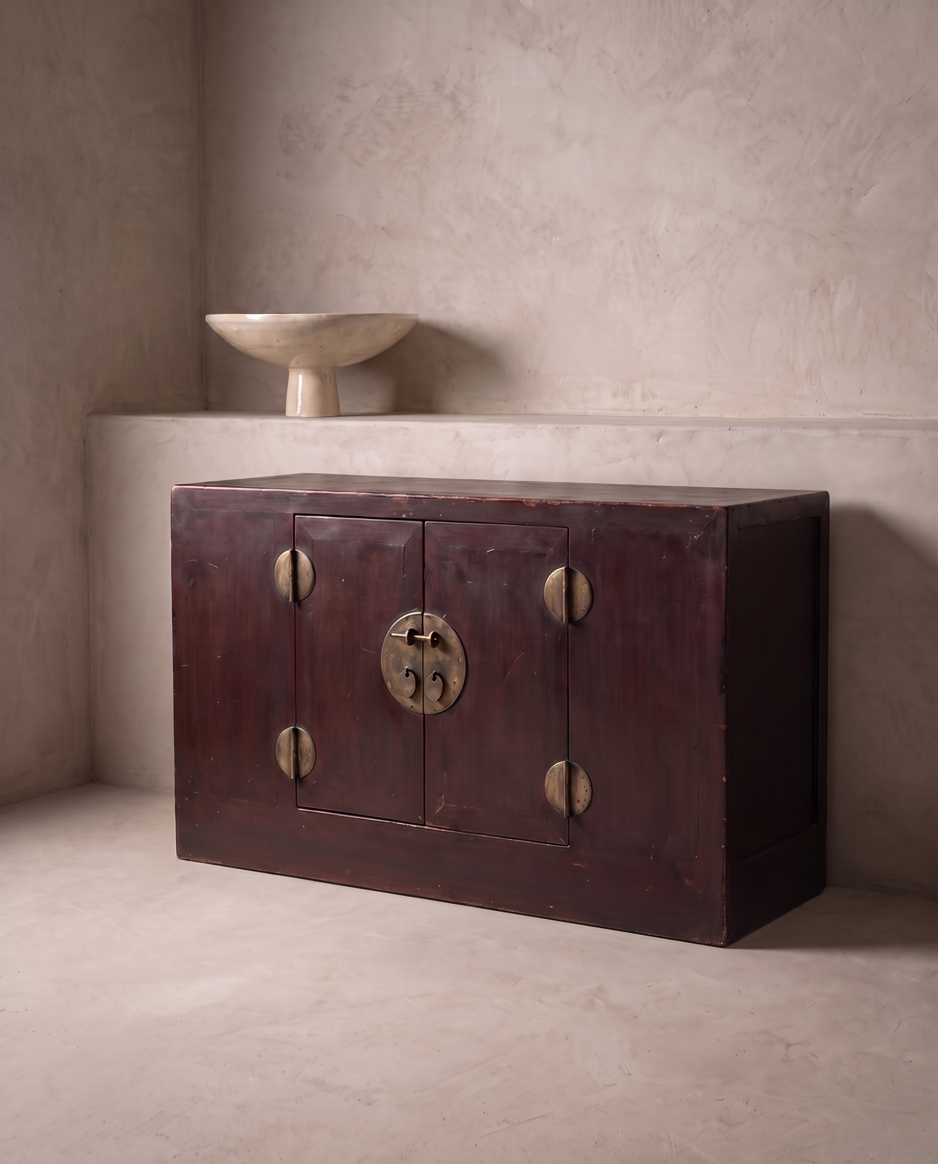 Antique Chinese oxblood lacquer cabinet, 45 degree three-quarter view, matte dark oxblood finish, true depth, perfectly flush plinth base