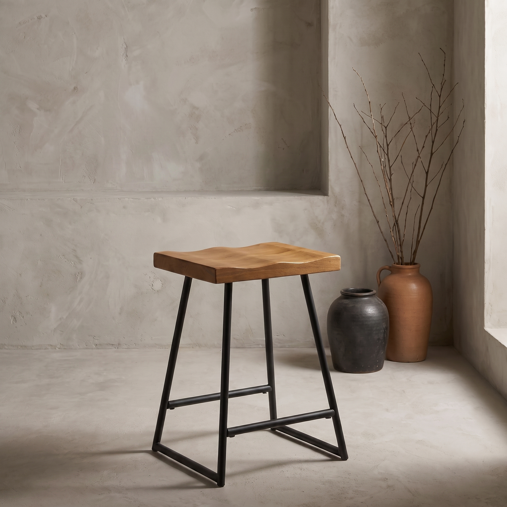Onda Stool against raw plaster wall