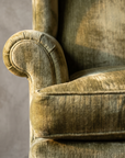 Macro detail of the rolled arm meeting the boxed seat cushion