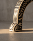 Macro detail of the flared bone inlay foot with striped banding