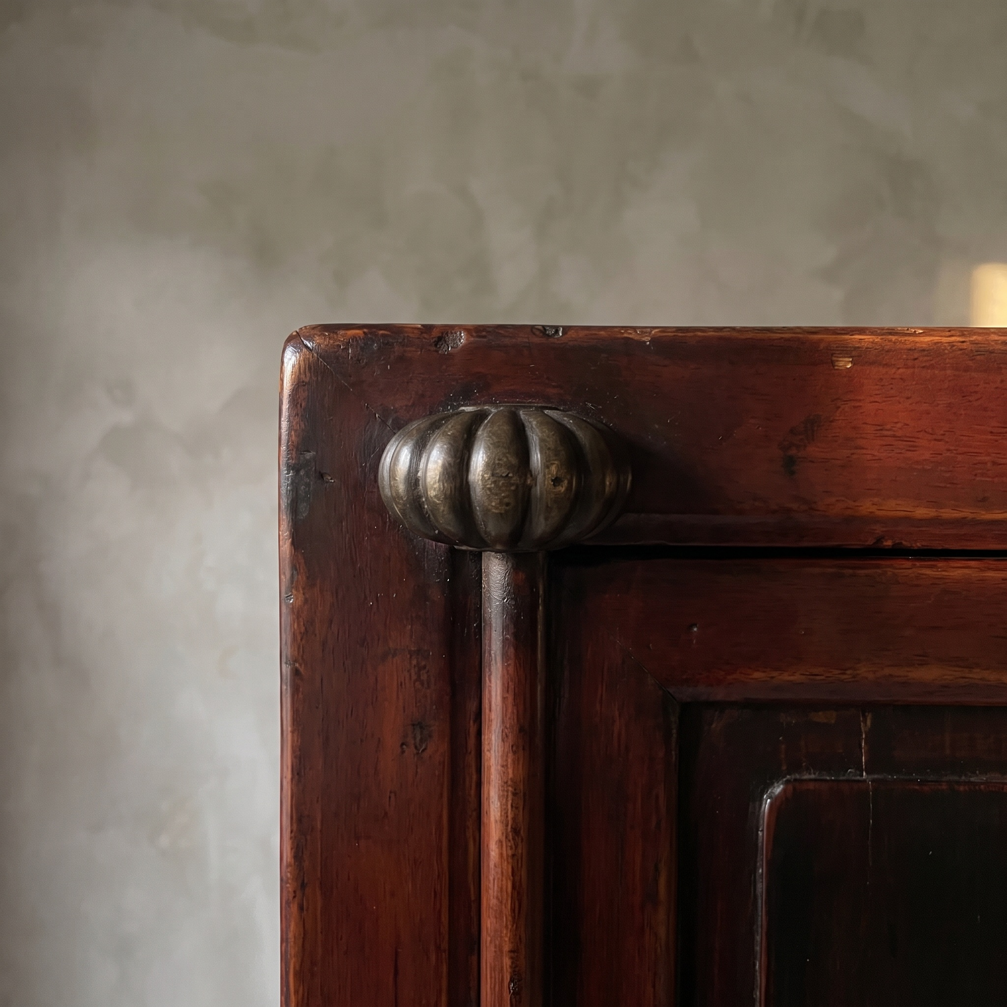 Macro detail of the fluted brass door pull