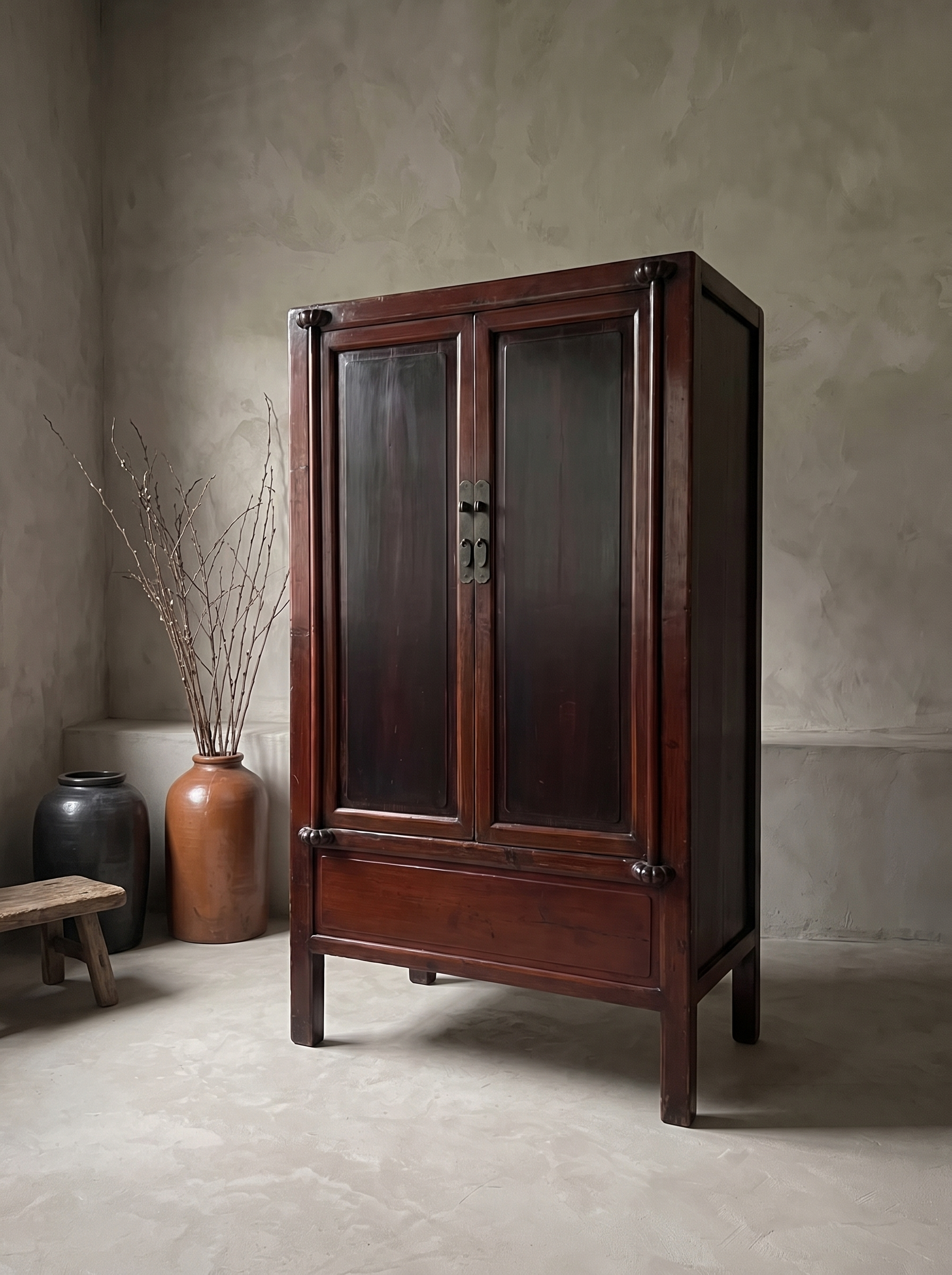 Antique oxblood lacquer Chinese armoire, three-quarter angle, doors closed