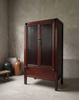Antique oxblood lacquer Chinese armoire, three-quarter angle, doors closed