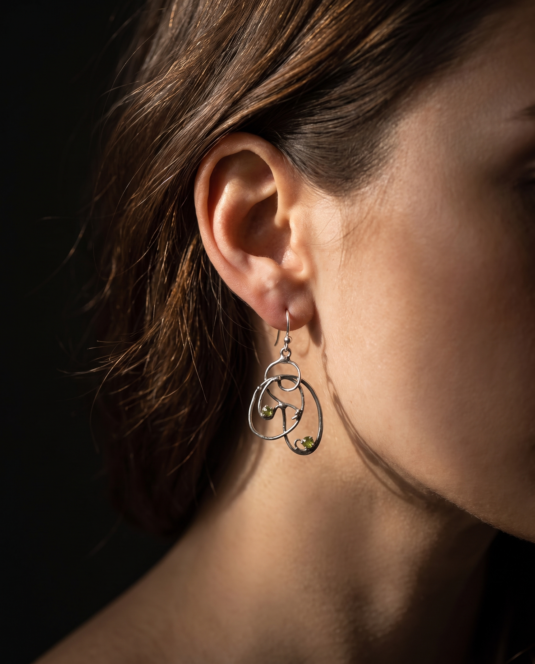 Model wearing Peridot Scribble Earrings