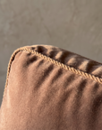 Macro detail of the velvet nap and twisted cord welt trim on the Taylor King sofa