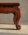 Close-up of the kang table's leg, apron, and ruyi cloud cutout