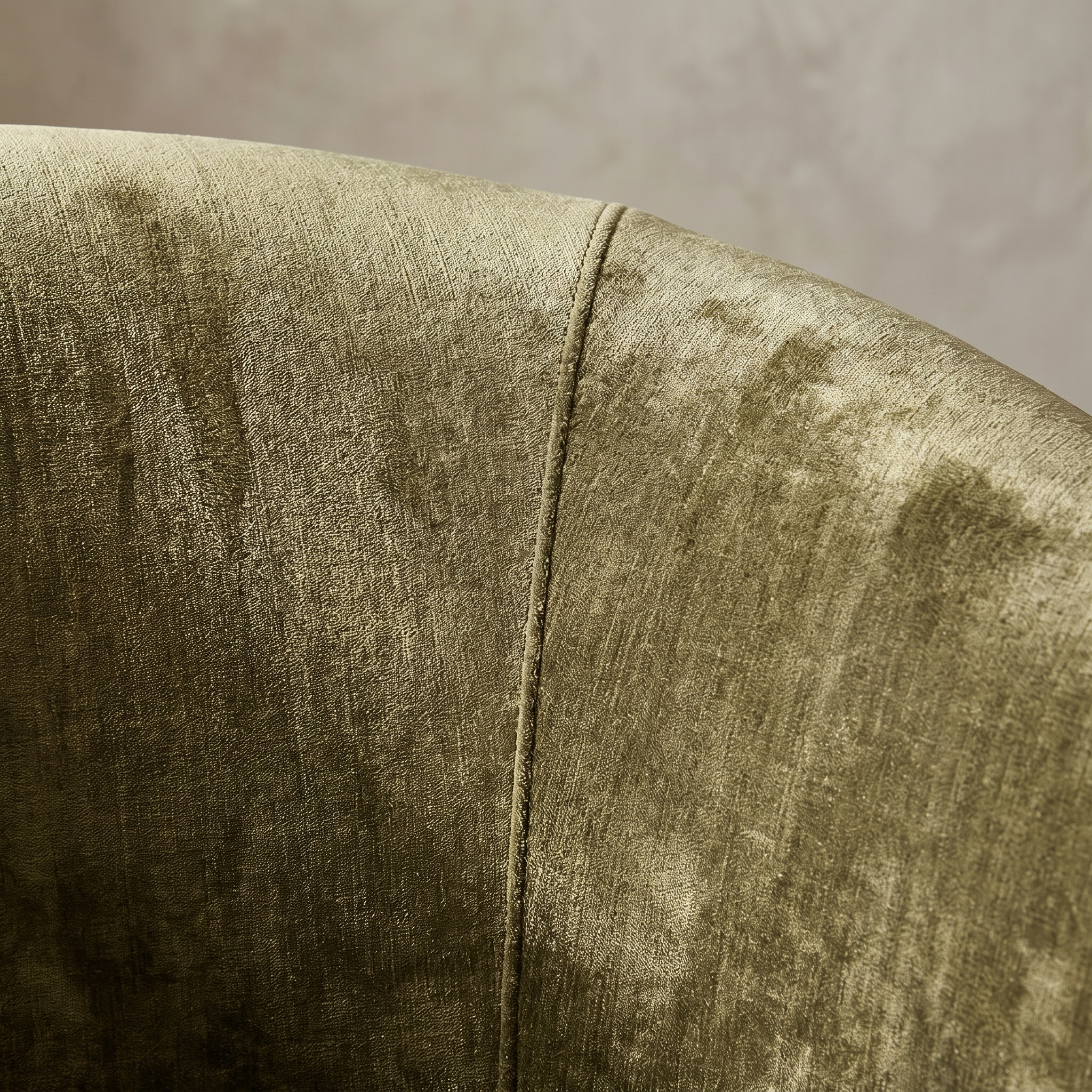 Macro detail of moss green chenille velvet and center back seam