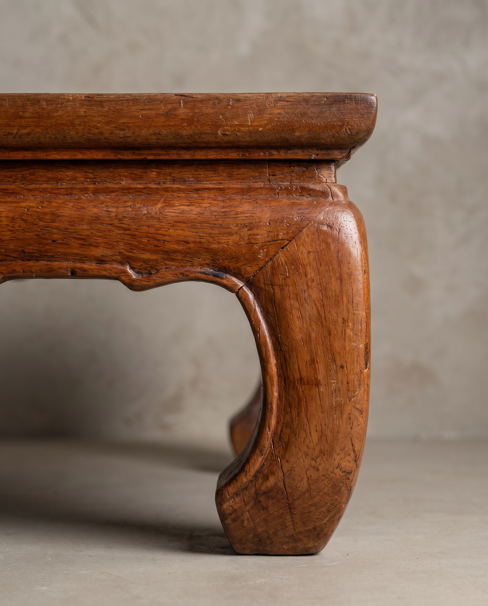 Small Kang Table, macro detail of scrolled opium-leg foot and apron cutout