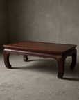 Large vintage elmwood kang table, three-quarter view showing full form