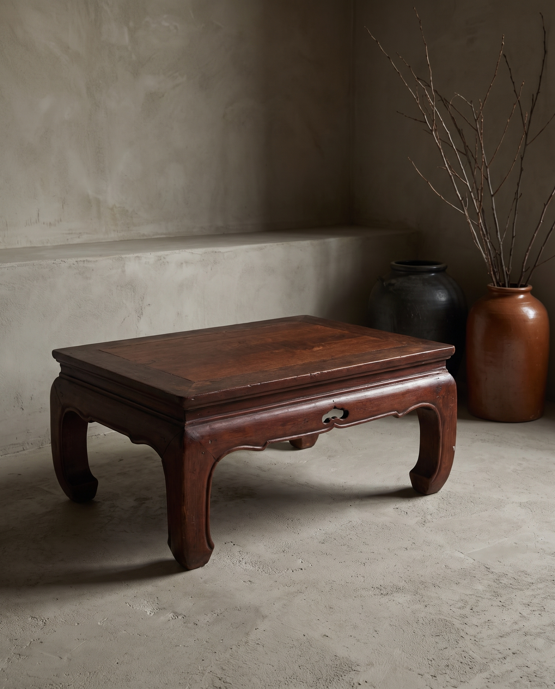 Large vintage elmwood kang table, lifestyle view in a greige plaster room