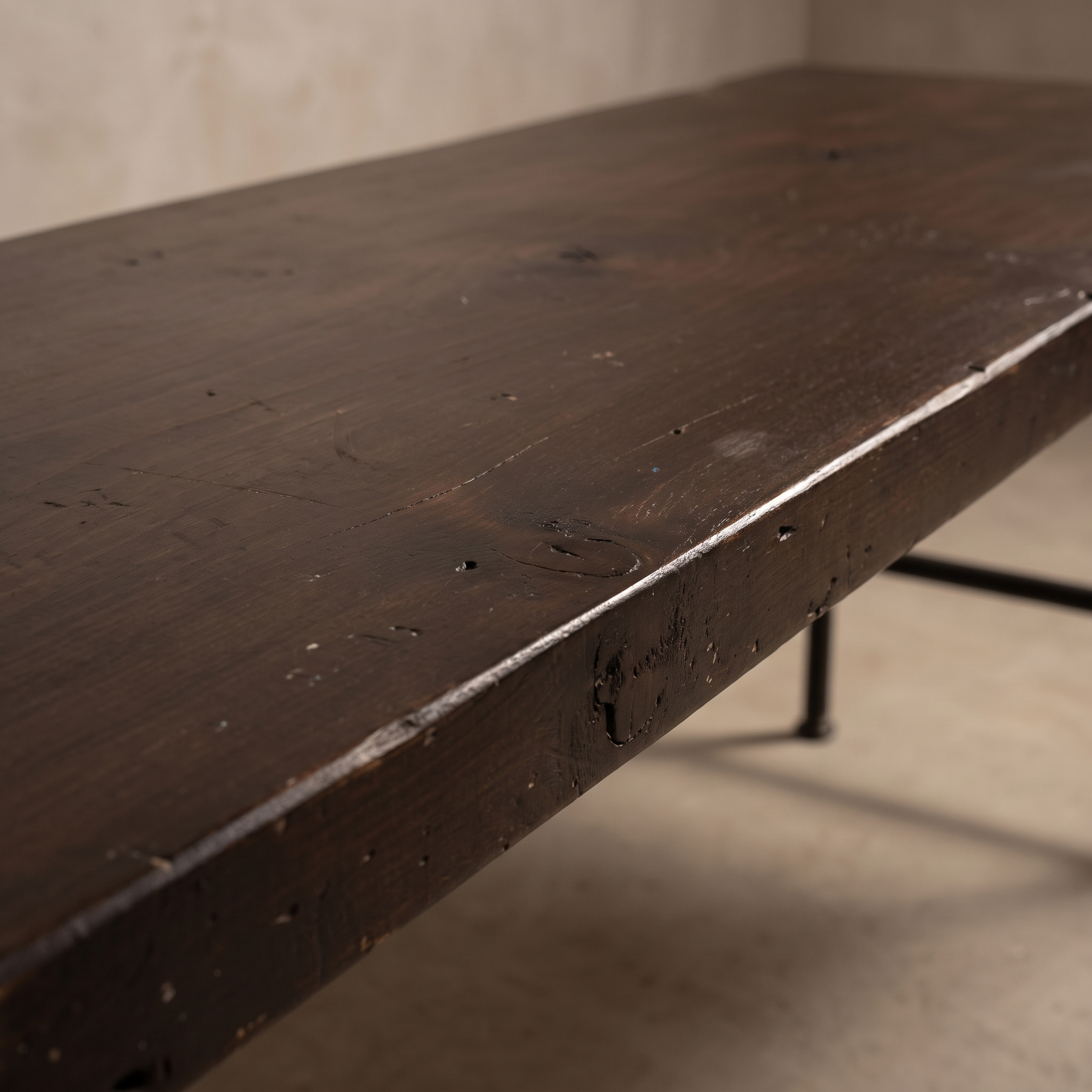 Close-up detail of the reclaimed wood tabletop grain, knots, and edge