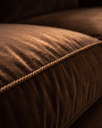 Macro detail of the velvet nap and twisted cord welt trim on the Taylor King sofa