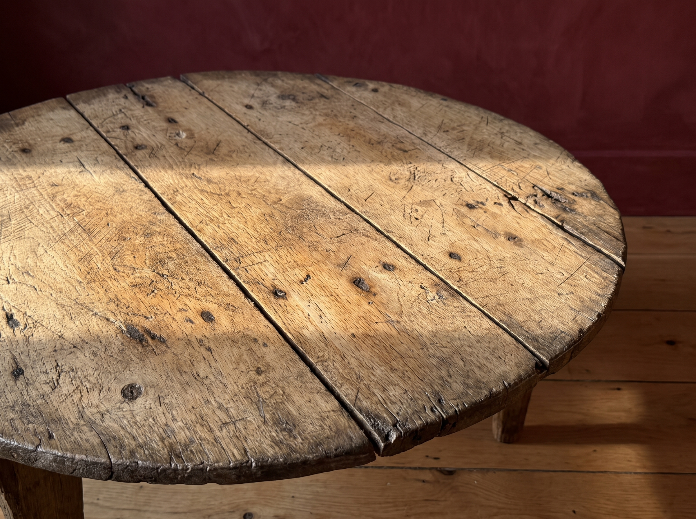 Antique round coffee table, darker, material macro detail