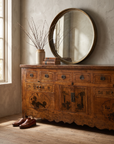 Antique Chinese hand-painted sideboard styled in an entryway with mirror, showing scale