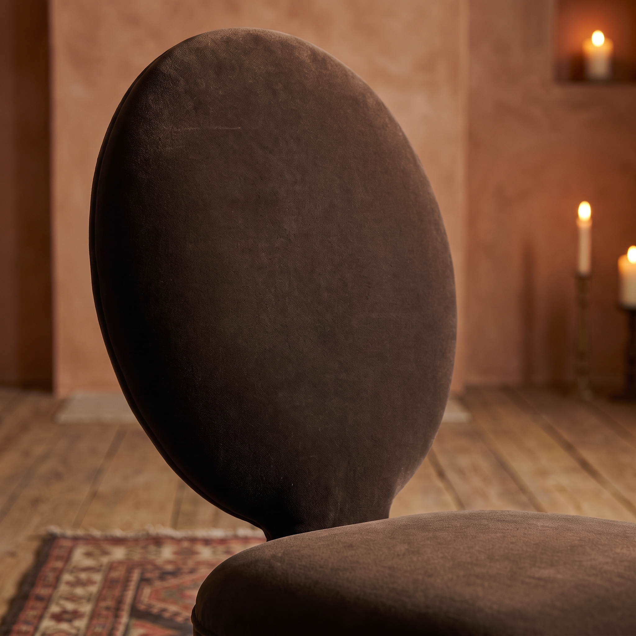 Detail of the oval velvet back and seat junction, alternate angle, warm domestic room
