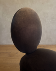 Detail of the oval velvet back and seat junction
