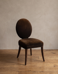 Mitchell Gold + Bob Williams oval-back dining chair in espresso brown velvet, alternate three-quarter view