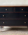 Atelier de Madeleine chest, alternate front view, ebonized finish with worn edges