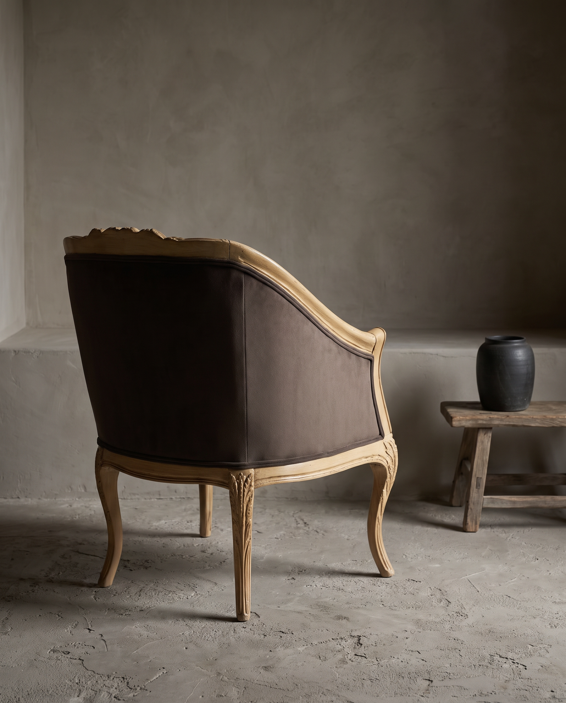 The Harvest, carved wheat motif bergere chair, back three-quarter view with smooth upholstered back