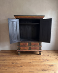 The Batavia Armoire with both doors open, showing the dark painted interior and single upper shelf