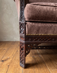 Detail of carved rosette corner block, pierced fretwork leg and brass nailheads