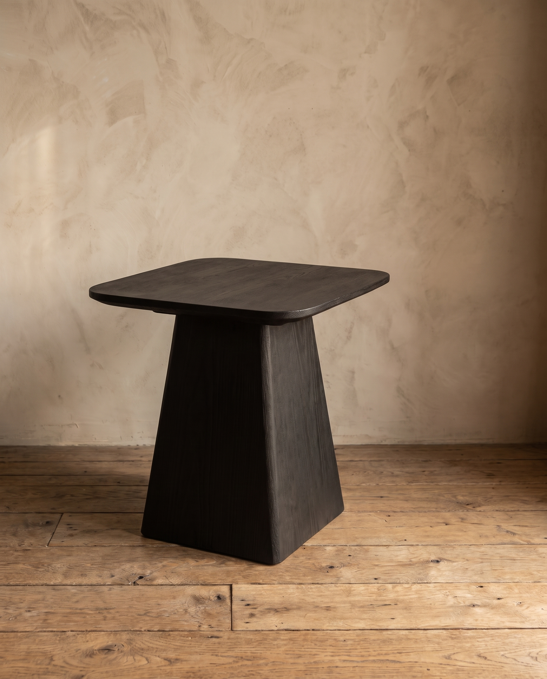 Ember Side Table at a three-quarter angle showing the squared top and tapered pedestal base
