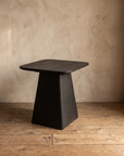 Ember Side Table at a three-quarter angle showing the squared top and tapered pedestal base