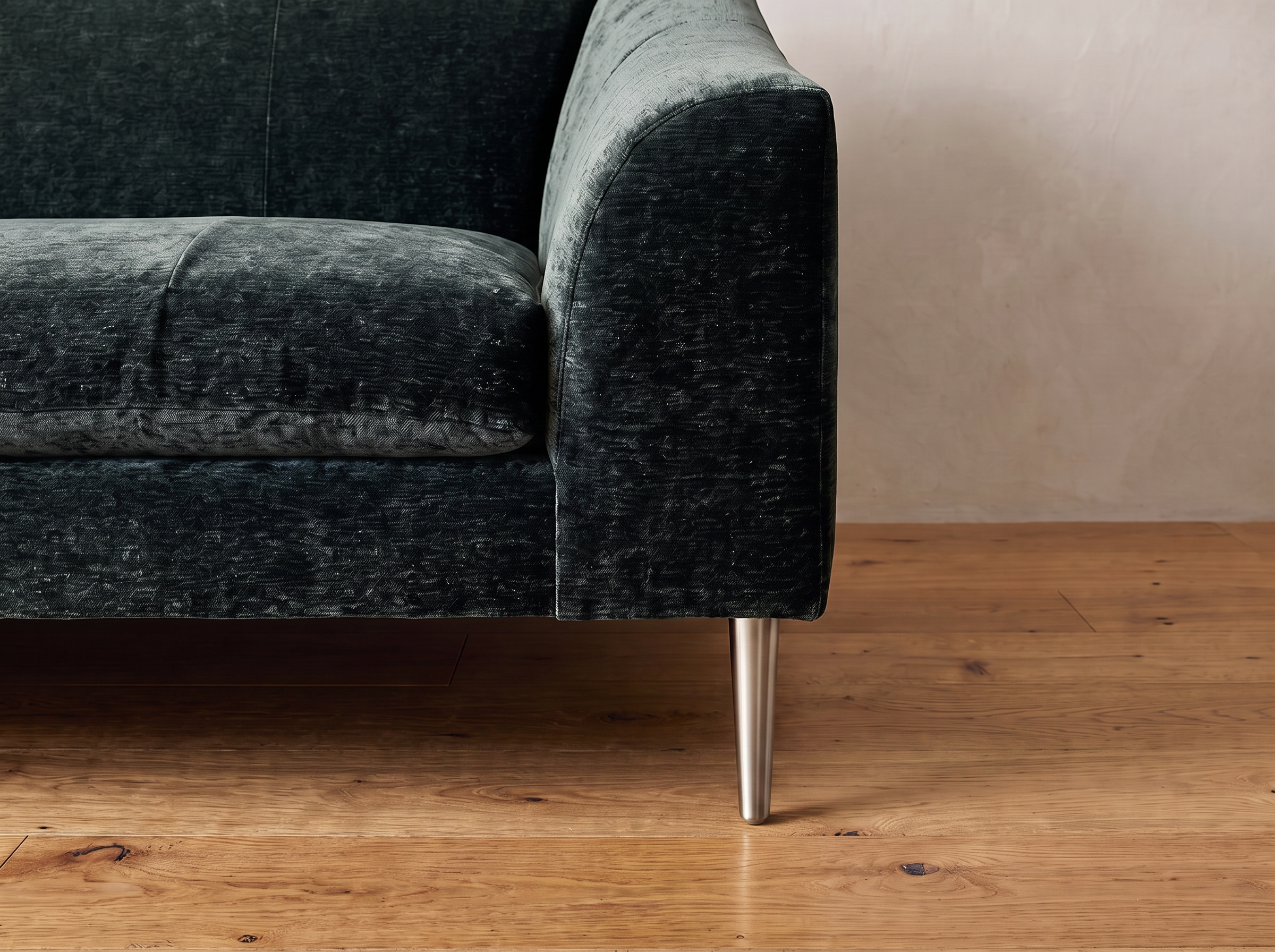 Detail of the left arm and brushed nickel leg