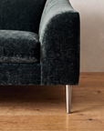 Detail of the left arm and brushed nickel leg