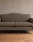The Marcel camelback sofa, straight-on view