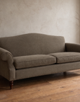 The Marcel camelback sofa, three-quarter view from the right