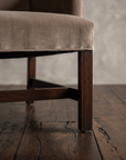Detail of the reeded mahogany front leg and stretcher