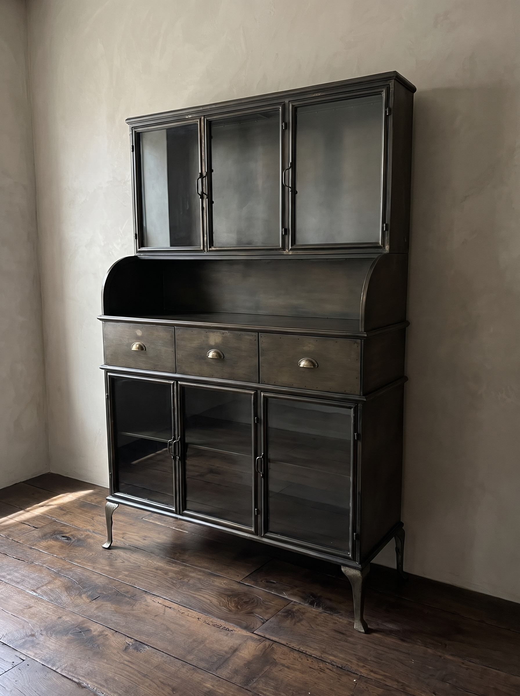 Gunmetal steel hutch at a 45 degree angle showing the curved side gallery and depth