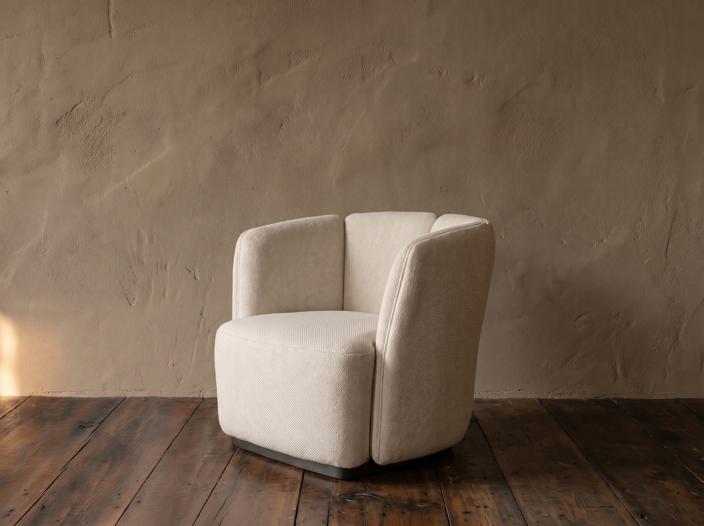 Ford armchair side profile with curved back segments and recessed dark base