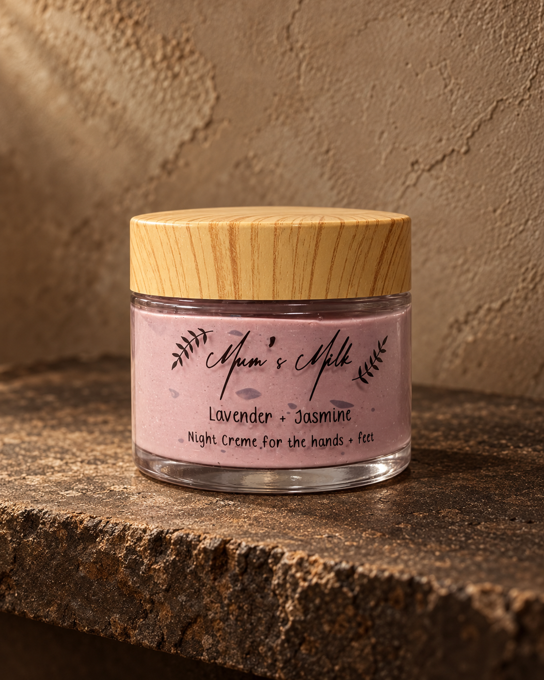 Mum's Milk Lavender and Jasmine Night Creme on weathered stone against warm textured plaster