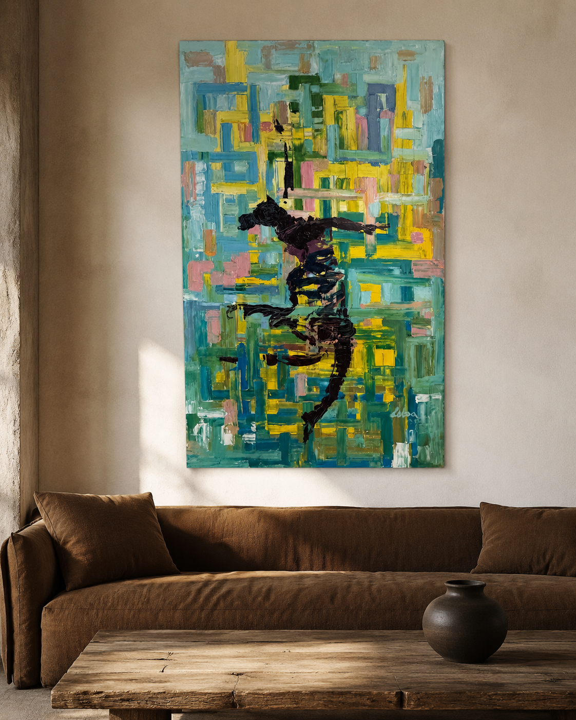 Teal and gold abstract painting of a dancer hung above a brown linen sofa in a warm plaster room