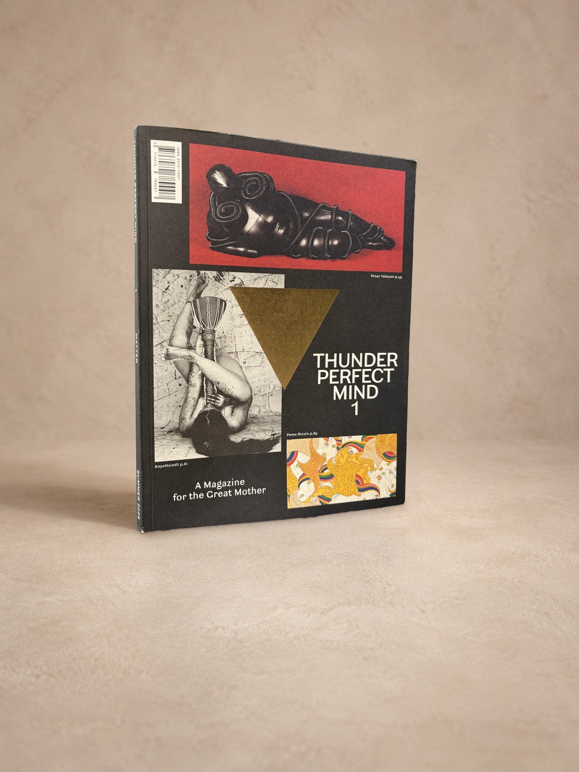 Thunder Perfect Mind Issue 1 magazine cover, black with gold triangle