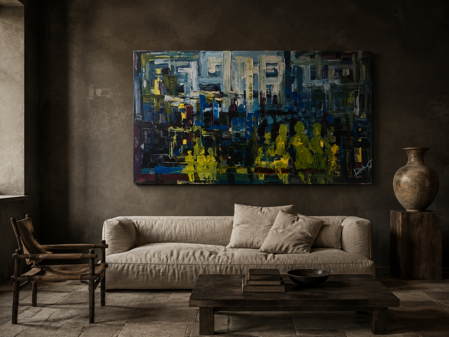 Doba Afolabi, Urban Procession, wide abstract cityscape in navy and chartreuse, hung above a linen sofa in a dark plaster room