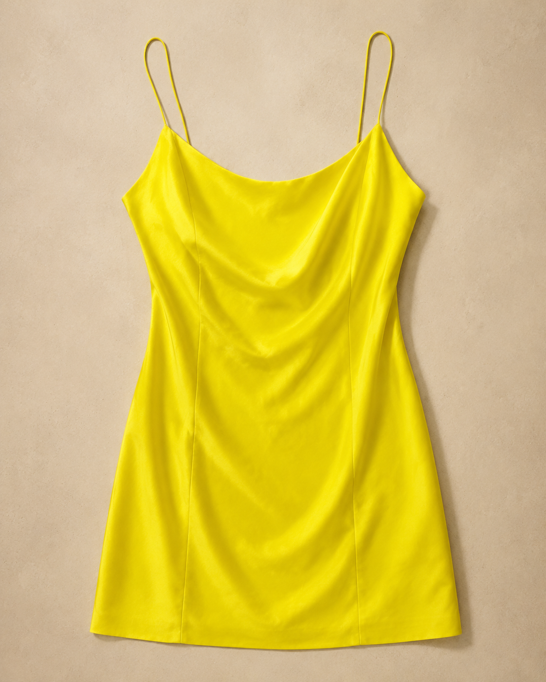 Yellow Satin Slip Dress laid flat, bright yellow satin with cowl neck and thin double straps